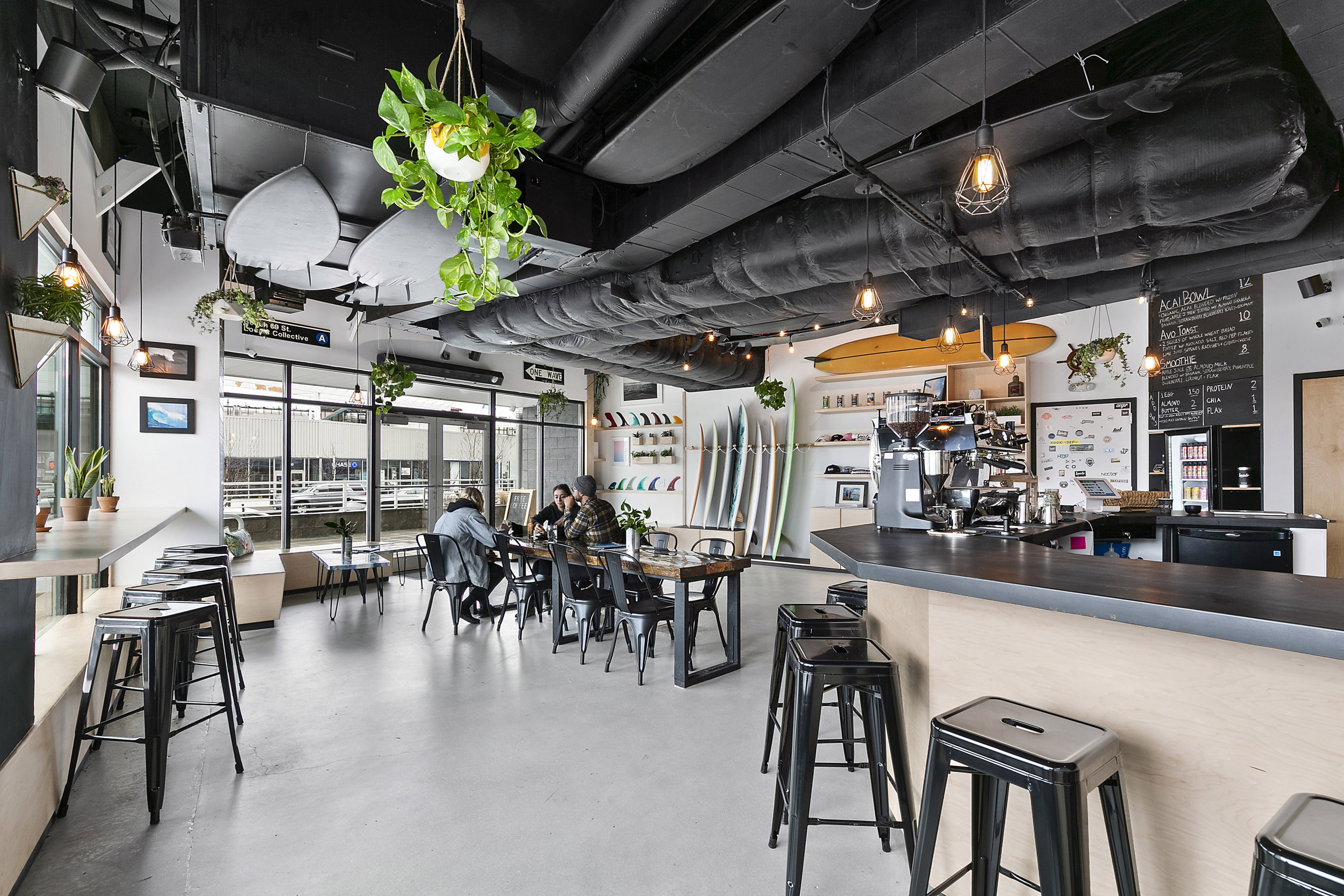 Photo of Locals Collective with tables and chairs